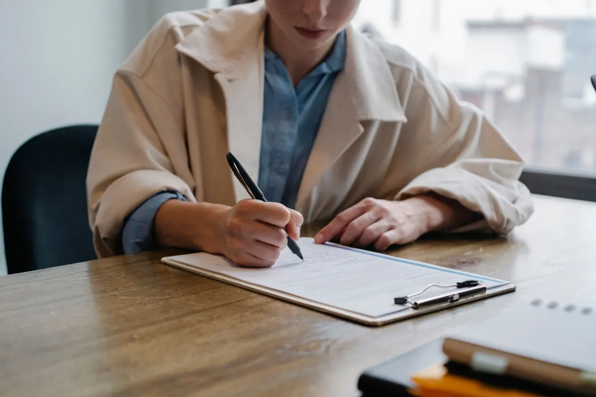 Client signing legal documents
